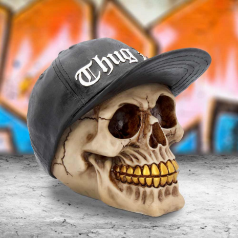 Nemesis Now - Thug Life Skull with Gold Teeth and Baseball Cap Figurine 15.8cm